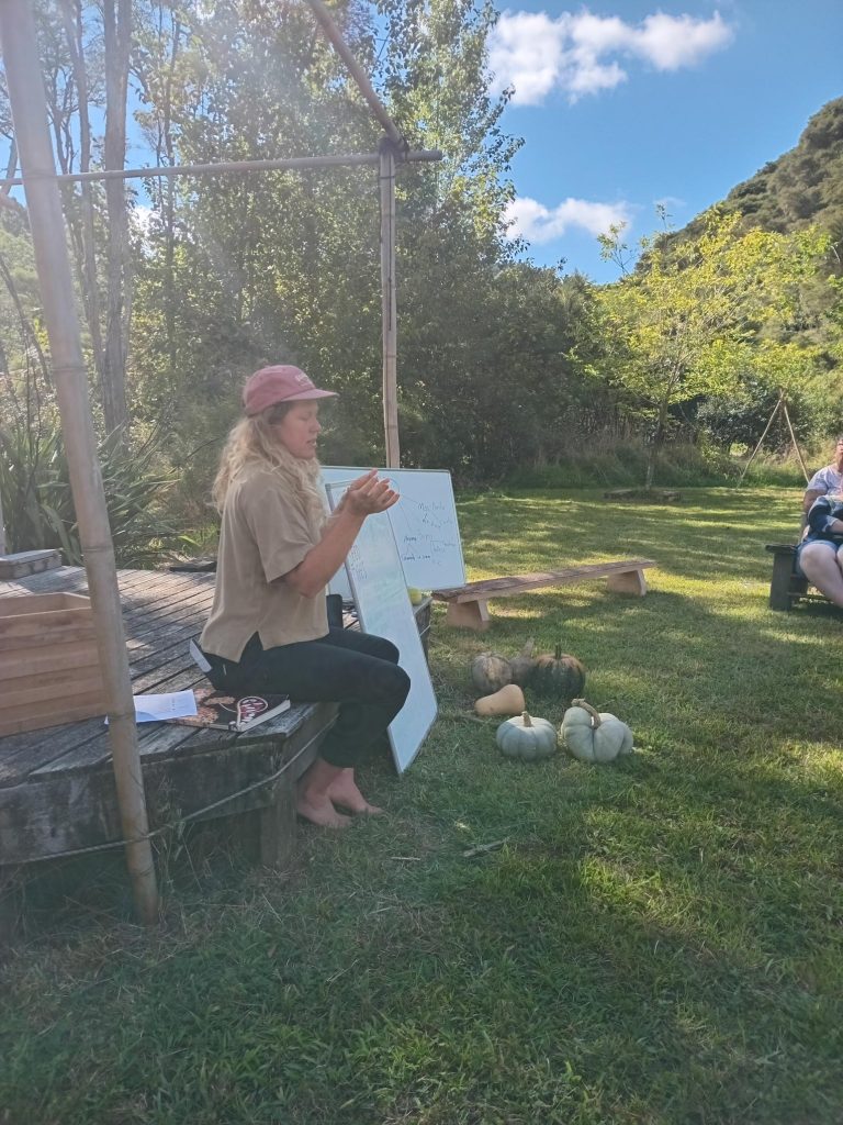 presenter speaking at seed saving workshop